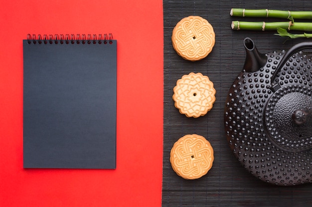 Free photo top view homemade biscuits with teapot