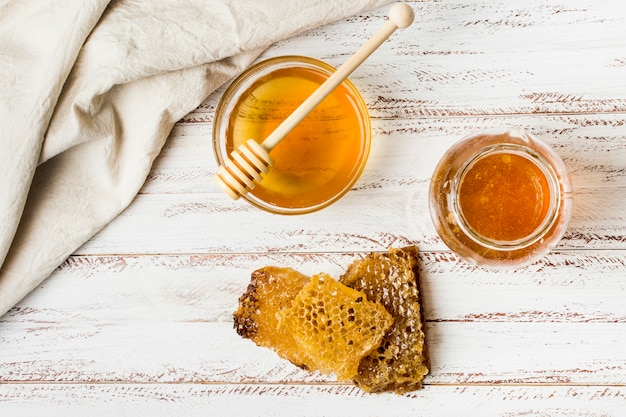 Top view honey jars with honeycomb