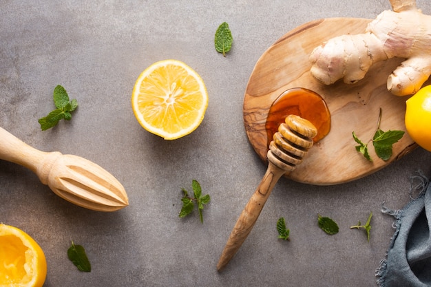 Top view honey with ginger and lemon