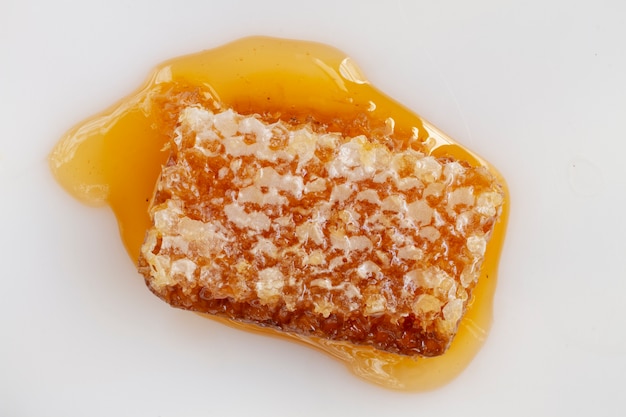 Top view of honeycomb with beeswax and honey