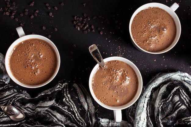 Free photo top view hot chocolate and cacao chips