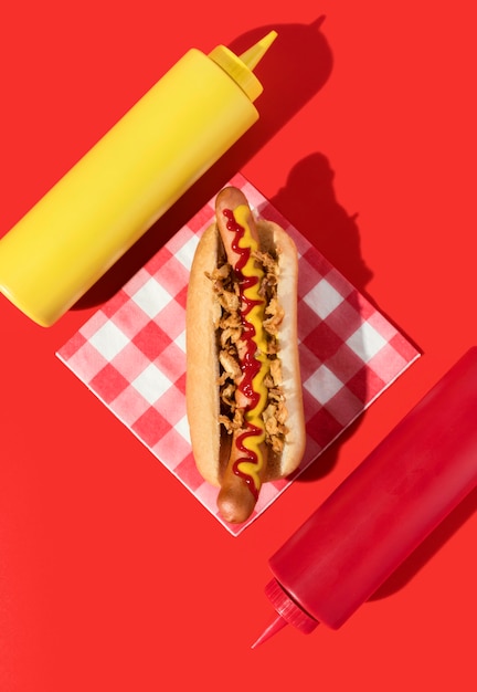 Free Photo top view hot dog with mustard and ketchup