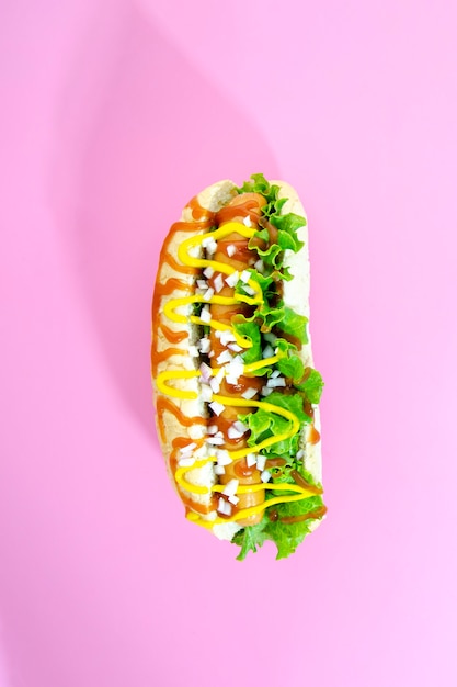 Free Photo top view of hotdog with onion and lettuce