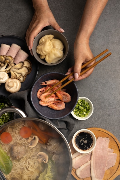 Free photo top view over hotpot dishes