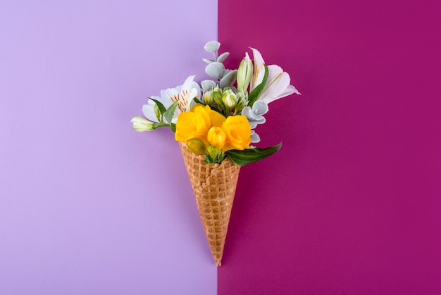 Top view ice cream cone with flowers