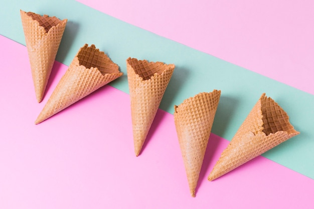 Free Photo top view ice cream cones on table