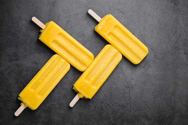 Top view ice cream on stick on table