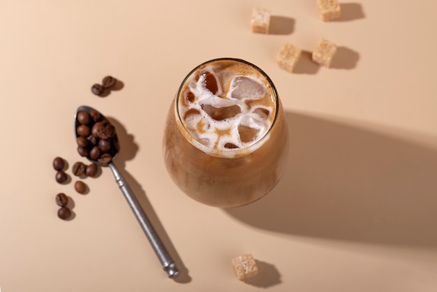 Top view  iced coffee and sugar cubes