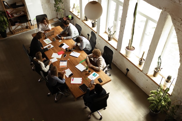 Top view image of motivated employees working together in the office Official meeting Concept of business