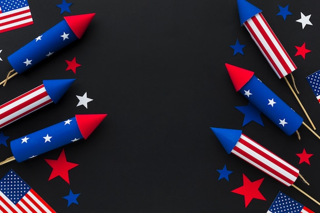 Top view of independence day fireworks with stars and american flags