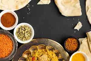 Free photo top view indian spices and food