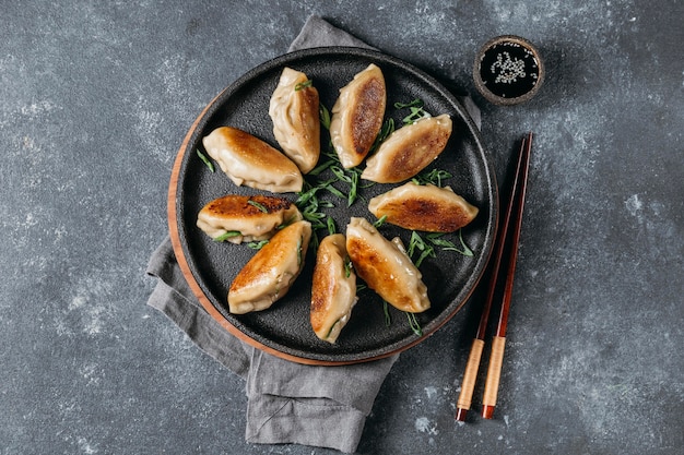 Free photo top view japanese dumplings assortment