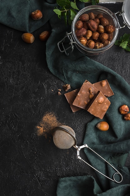 Free Photo top view jar filled with hazelnuts