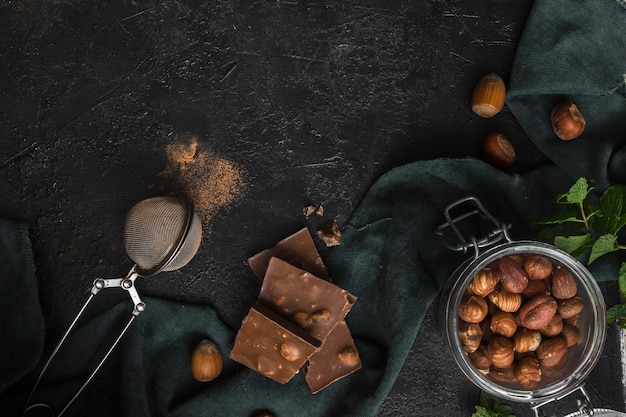 Top view jar with hazelnuts and chocolate