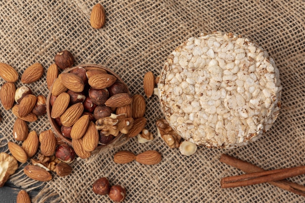 Top view of jar with hazelnuts and other nuts