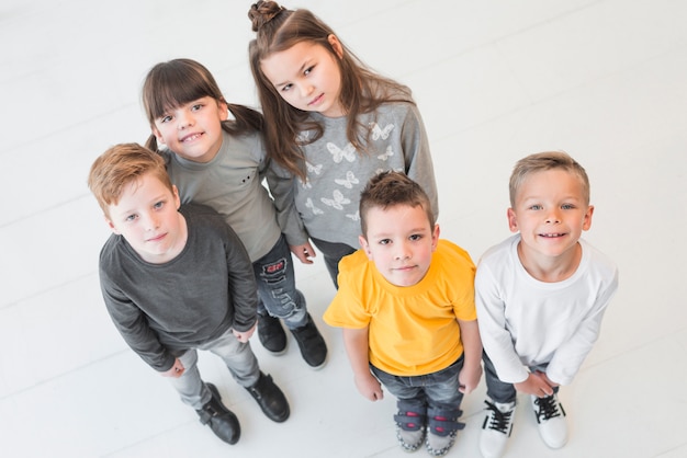 Free photo top view kids posing together