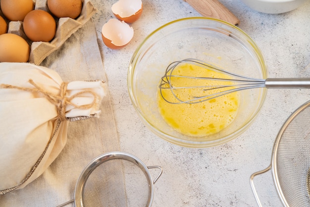 Top view kitchen supplies with pasta ingredients