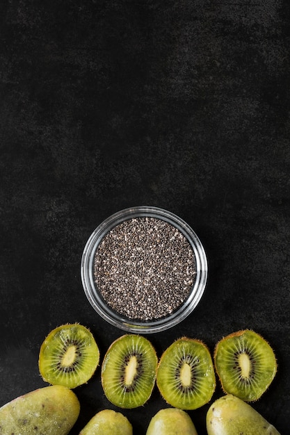 Top view of kiwi popsicles with poppy seeds