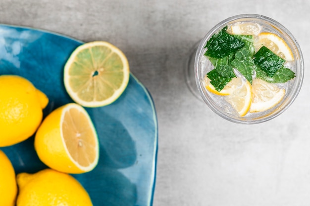 Top view of lemon plate and lemonade