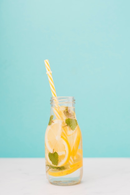 Top view lemonade bottle with straw