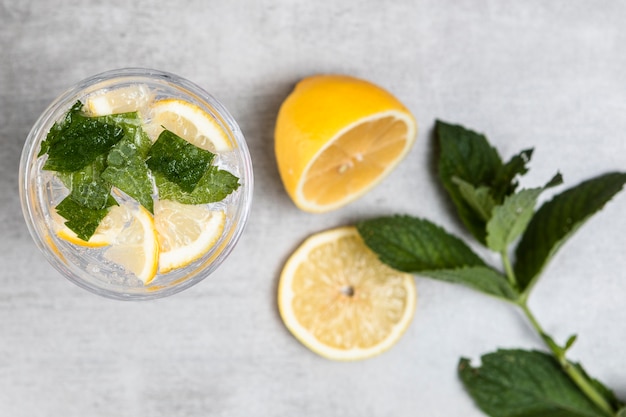 Free photo top view of lemonade on wooden background