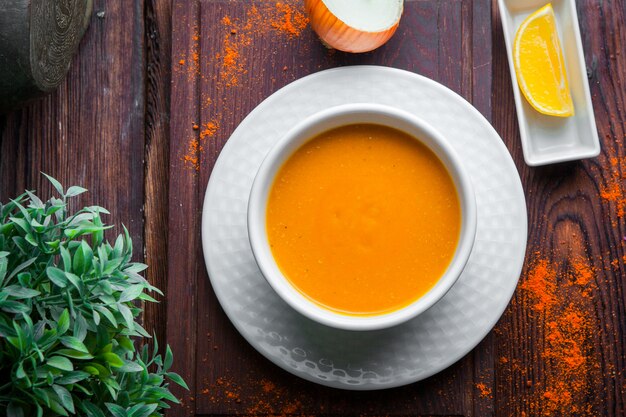 Top view lentil soup with onion and lemon horizontal