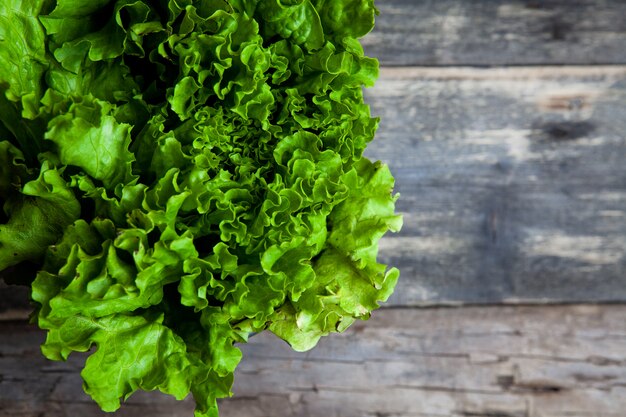 Top view lettuce on wooden background. horizontal