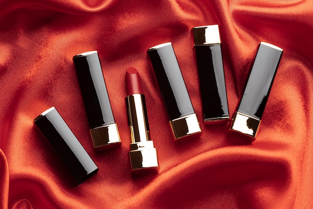 Free photo top view lipsticks arrangement