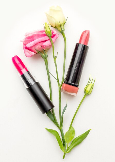 Top view lipsticks with flowers