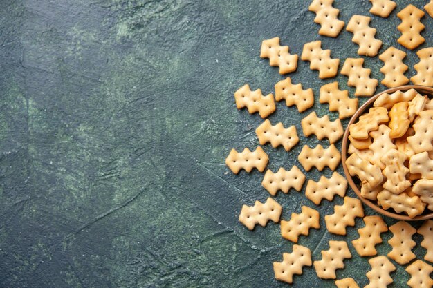 Top view of little salted crackers in bowl