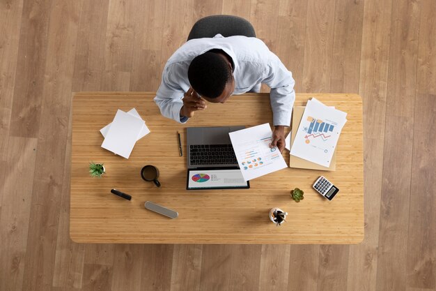 Top view man working at office