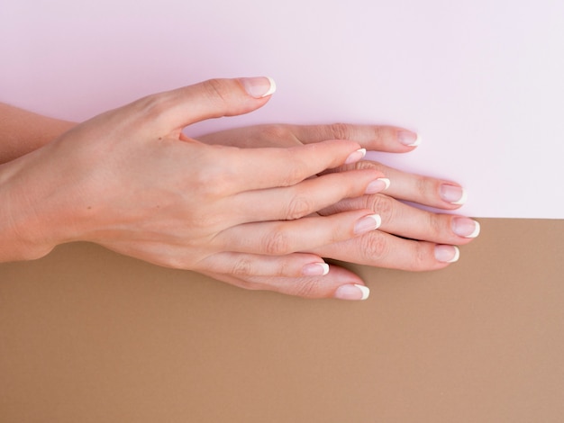 Top view of manicured woman hands