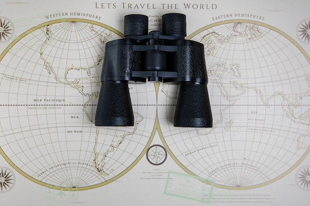 Top view map and binocular on table