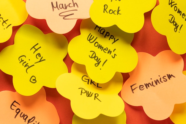 Top view of messages on sticky notes for women's day