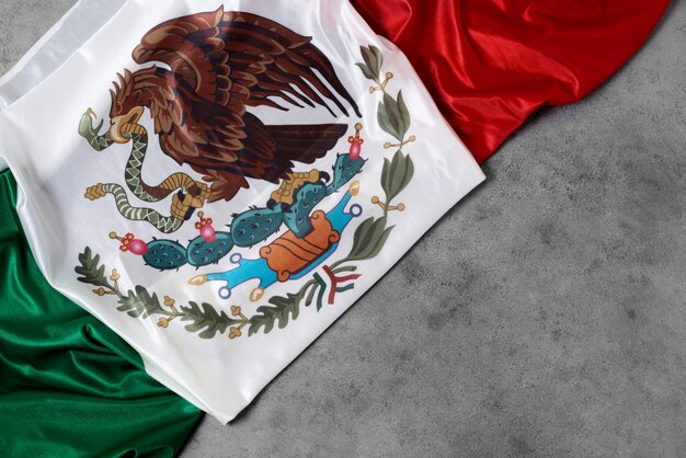 Top view mexican flag with eagle on floor