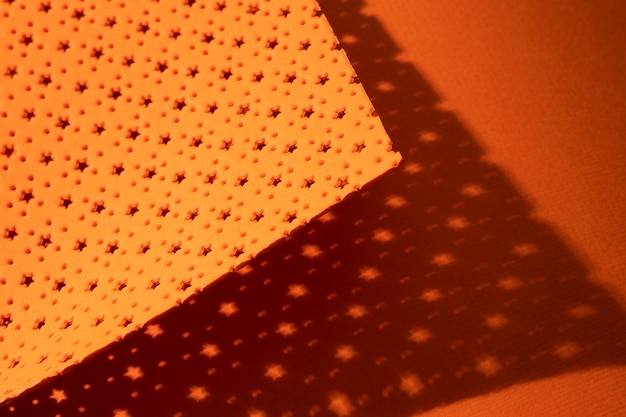 Top view microperforated sheet with orange background