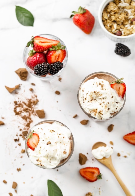 Top view milkshakes with fruits