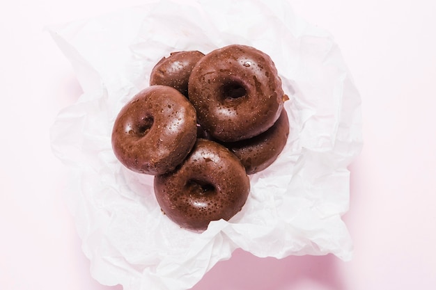 Free Photo top view mini donuts on a napkin