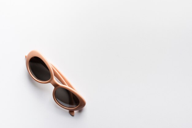 Top view modern sunglasses with copy space