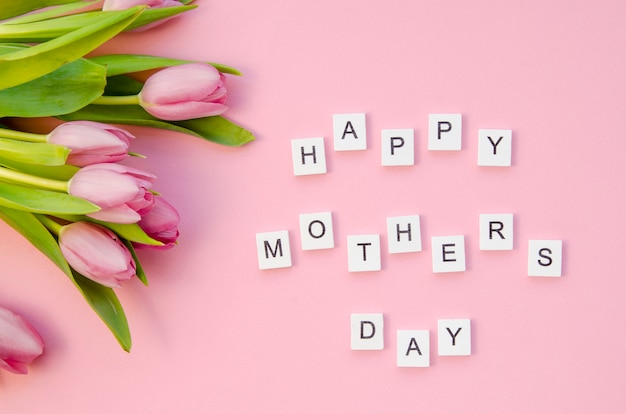 Free photo top view mothers day greeting with flowers