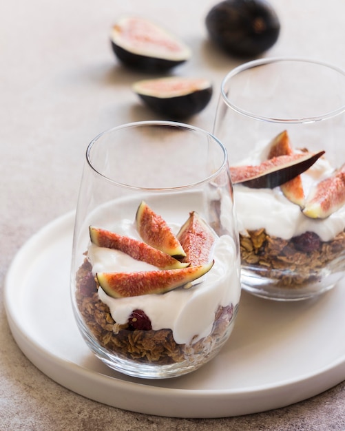 Free Photo top view of muesli with oranges in glass