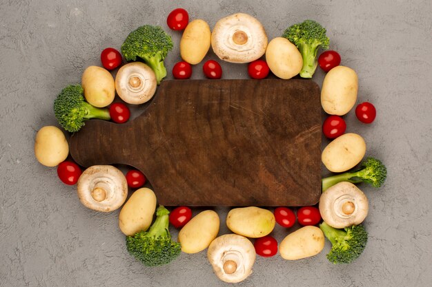 Free Photo top view mushrooms broccoli potatoes fresh ripe on the grey