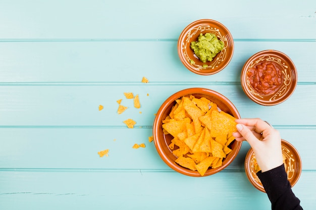 Free Photo top view of nachos and guacamole