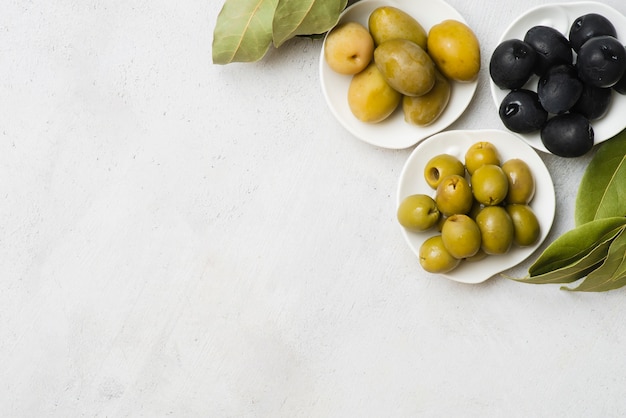 Free photo top view natural olives with copy space