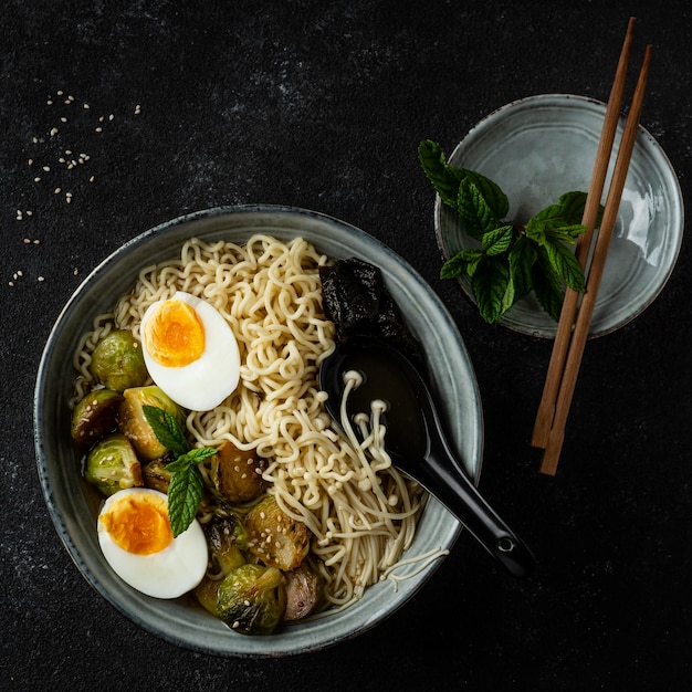 Top view noodles in a bowl arrangement