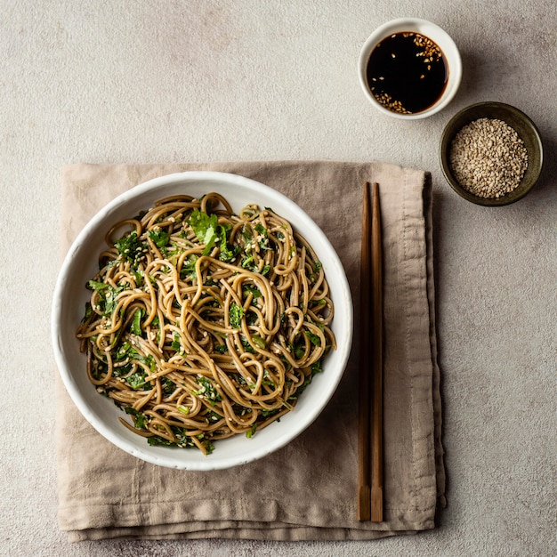 Free photo top view noodles in a bowl composition