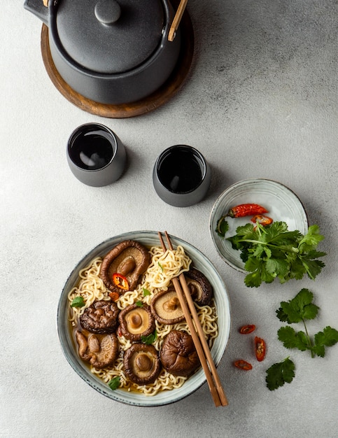 Free photo top view noodles in a bowl composition