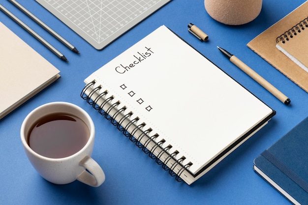 Top view notebook with checklist on desk