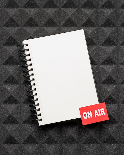 Top view notepad on air concept