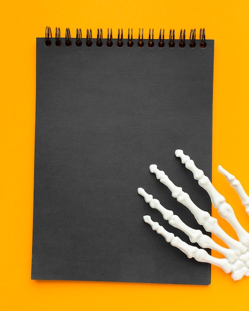 Free photo top view notepad for halloween